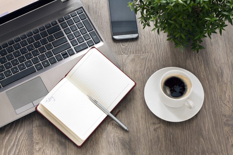 Mobile,Workplace,With,Coffee,And,Plant